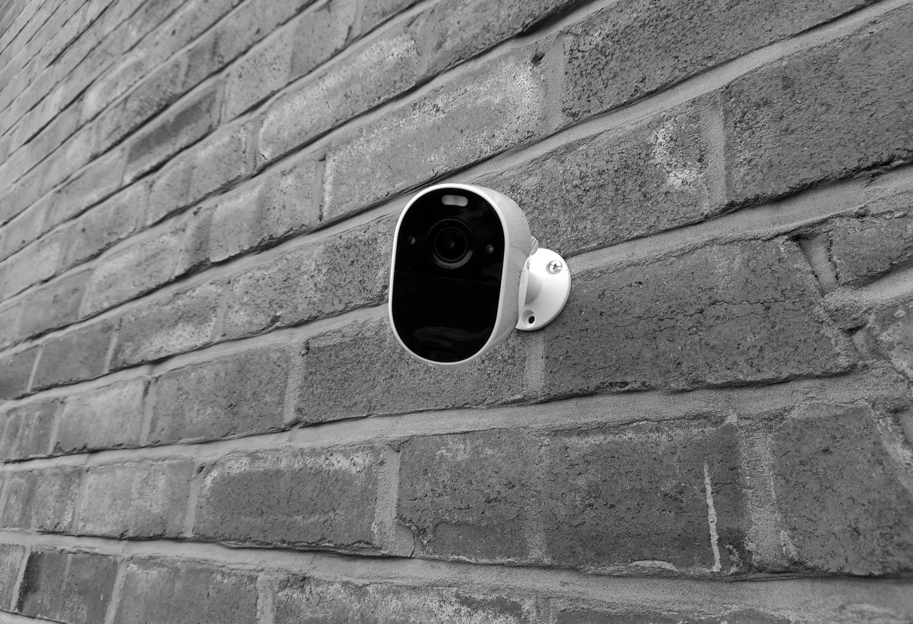 solar security camera mounted exterior wall