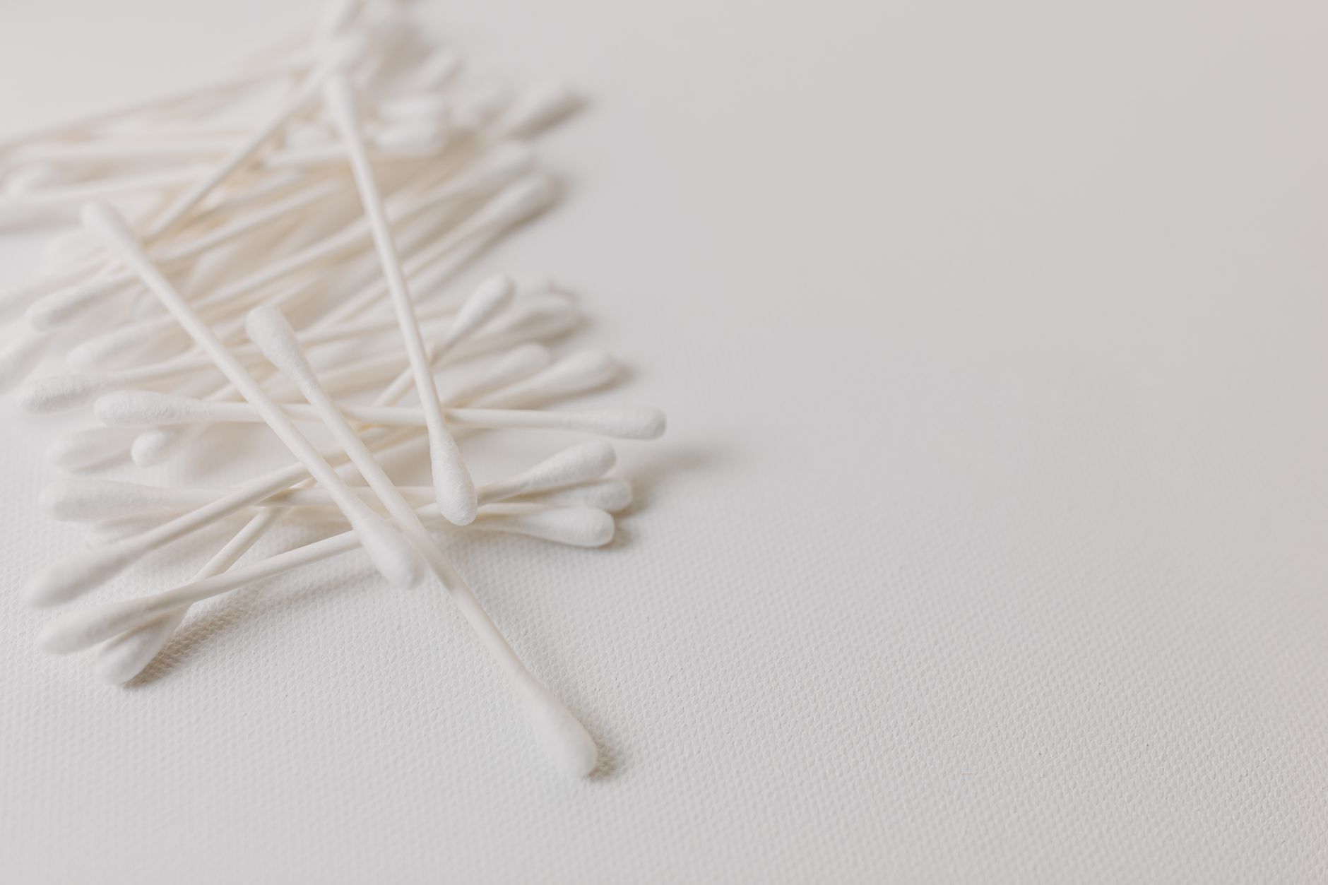 cleaning airpods cotton swab